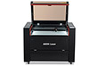 Aeon Nova10 S 女明星跪成一排伺候主人  Professional CO2 Laser Cutter and Engraver front overhead view with lid open